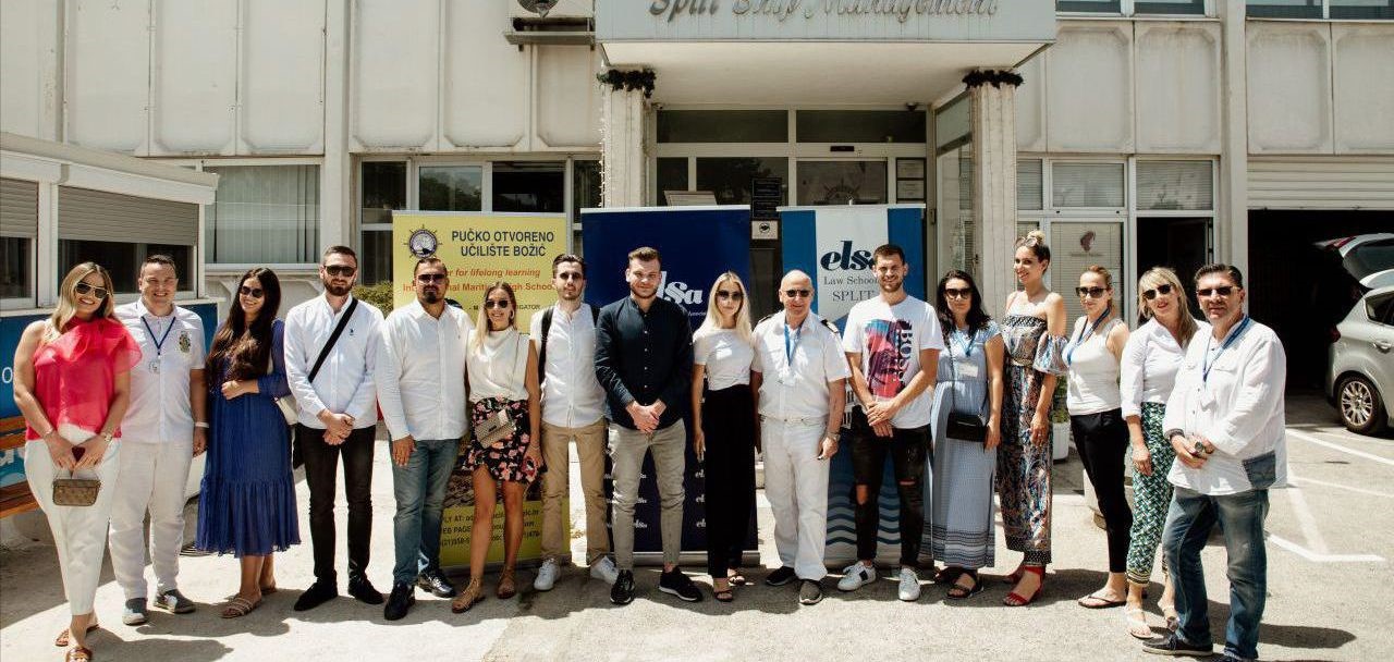 Group photograph outside Božić Adult Education College